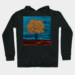 A tree with gold leaves in a storm Hoodie